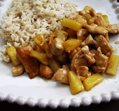 Honey lime chicken on a plate with rice.