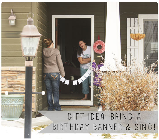 Sing a song with a banner to wish your friend happy bday