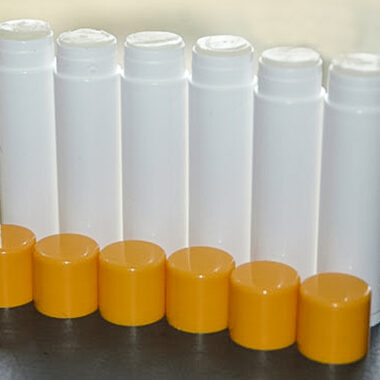 Lip Balm Recipe (Burts Bees Copycat) Chapstick tubes lined up.