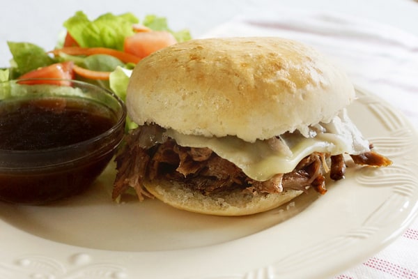 Slow Cooker Roast Beef French Dip Sandwiches are a delicious, quick, tasty, hearty dinner. Plus it's one of the easiest freezer meals I make! | happymoneysaver.com