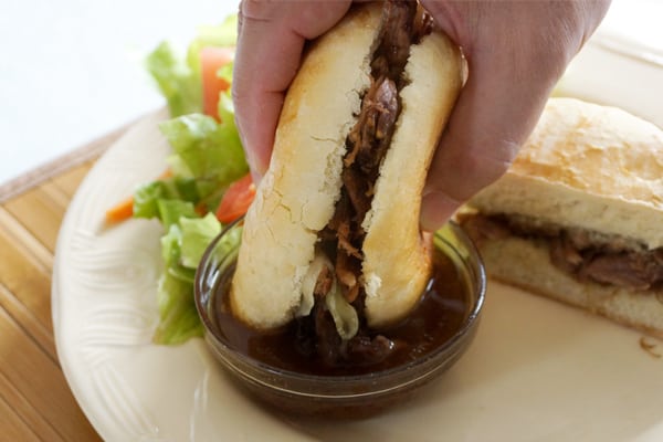 Slow Cooker Roast Beef French Dip Sandwiches are a delicious, quick, tasty, hearty dinner. Plus it's one of the easiest freezer meals I make! | happymoneysaver.com