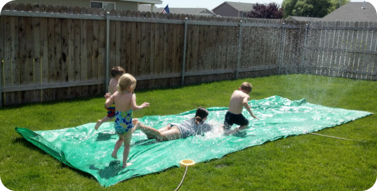 giant slipping slide fun - 20 summer activities on a budget