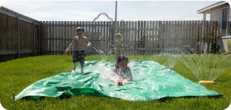 giant slipping slide fun - 20 summer activities on a budget