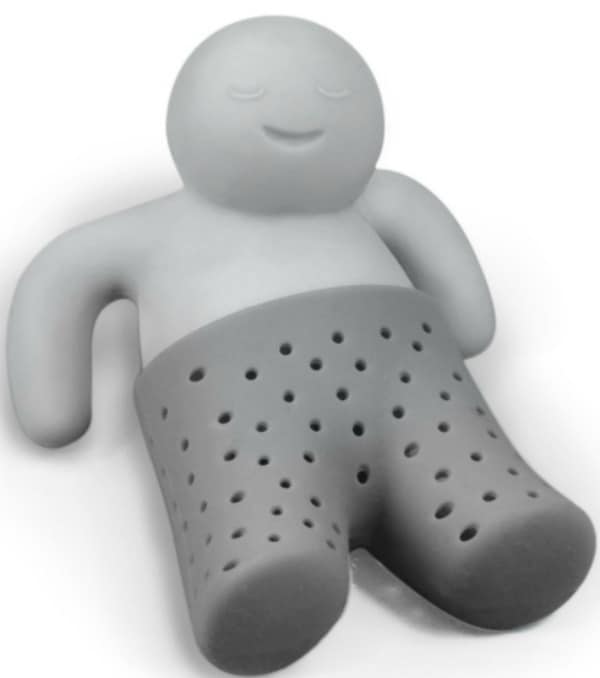 An man with pants on with holes in it.