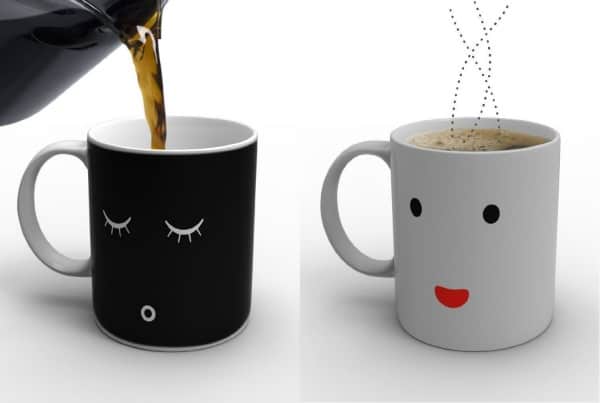 Two mugs - one black with sleeping eyes and one white wide awake - unique gift ideas for men