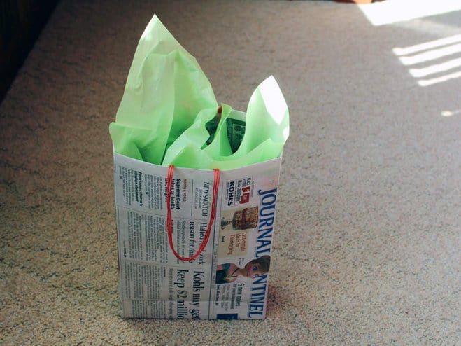 This might be the most frugal way to make a gift bag because almost everyone has newspaper around the house!