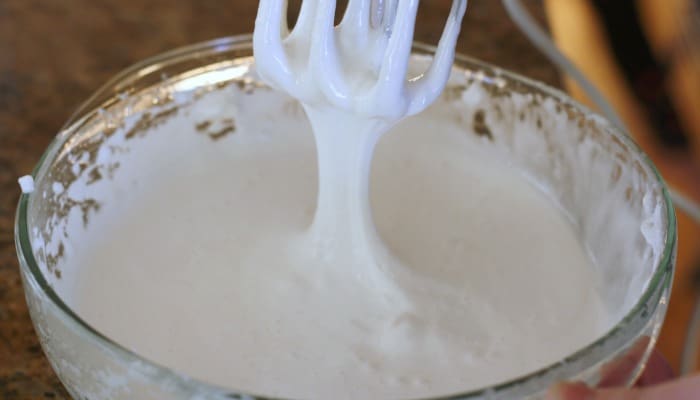 This old recipe {from 1900's recipe box} for homemade marshmallow frosting is a big winner! It is silky smooth and tastes just like melted marshmallows. Perfect on cupcakes! 