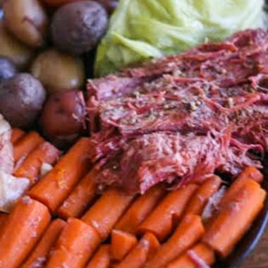 This homemade corned beef and cabbage recipe is so easy to make and the flavor is amazing. Recipe uses simple ingredients and is cooked in the crock pot!