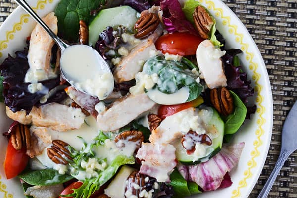 This homemade Roquefort salad dressing recipe rivals any bottled dressing on store shelves - it's creamy, tangy, and downright perfect!