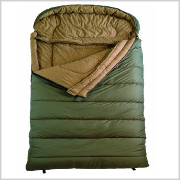 A green sleeping bag zipped open at the top and folded down.