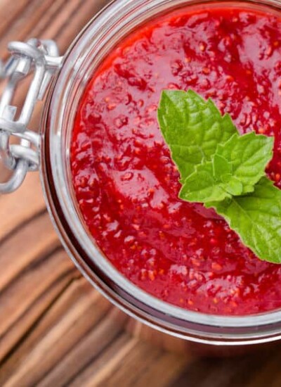 Glass jar of chia seed strawberry jam.