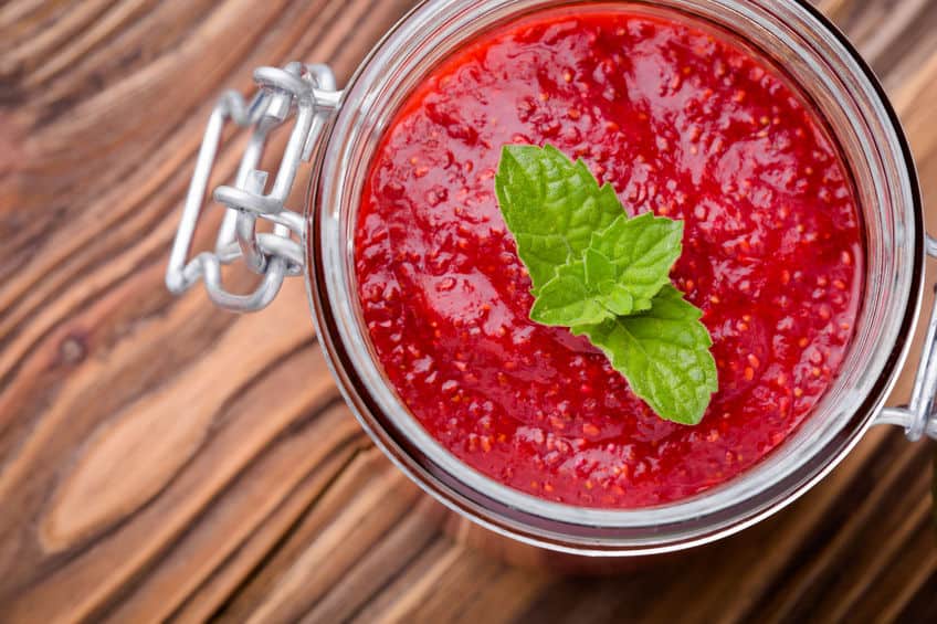 Glass jar of chia seed strawberry jam.