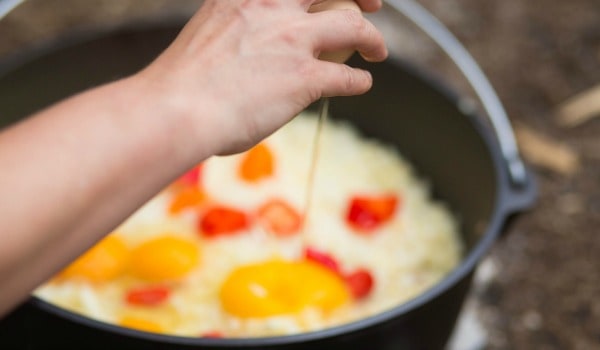 This 5 Layer Dutch Oven Country Breakfast from happymoneysaver.com is one of the very best camping meals. #campingmeals #campingrecipes #dutchoven #camping