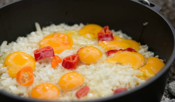 This 5 Layer Dutch Oven Country Breakfast from happymoneysaver.com is one of the very best camping meals. #campingmeals #campingrecipes #dutchoven #camping