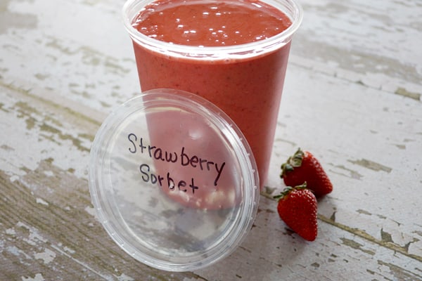 This Easy Freezer Strawberry Sorbet Recipe is healthy, delicious and only uses 3 ingredients! It's so easy that no ice cream machine needed, just a blender! happymoneysaver.com