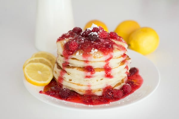 This lemon pancake recipe is the stuff that dreams are made of! Light, tender, and full of flavor thanks to it's special secret ingredient - Lemon essential oil. | happymoneysaver.com