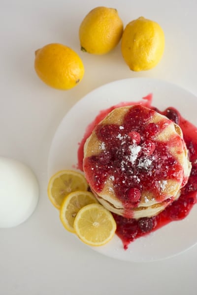 This lemon pancake recipe is the stuff that dreams are made of! Light, tender, and full of flavor thanks to it's special secret ingredient - Lemon essential oil. | happymoneysaver.com