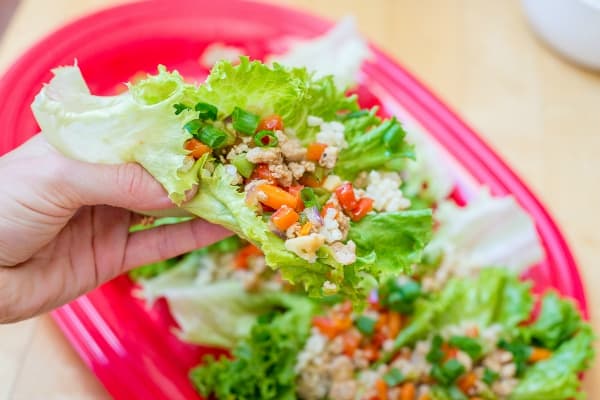 Simply the best asian wraps I've ever eaten including PF Changs. These Asian Lettuce Chicken wraps are an absolute dream! Lots of veggies, chicken, crunchy peanuts and a sauce to die for! Better yet, it freezes beautifully. | happymoneysaver.com