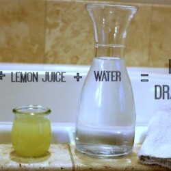 Containers with text "Baking soda + lemon juice + water = homemade drain cleaner."