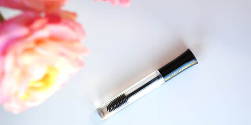 Eyelash brush with pink flowers.