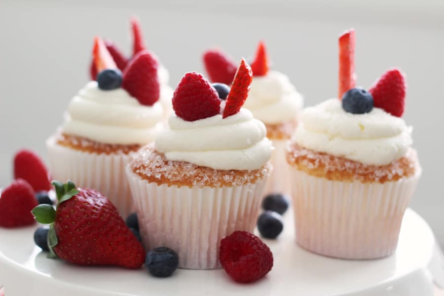 Berries on a Cloud Cupcake Recipe using Angel food cake, sugar crystals and marscapone frosting. Heavenly I tell ya..heavenly. The perfect housewarming cake ever.