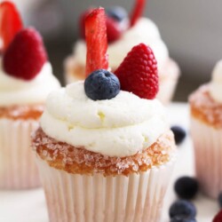 The BEST cupcake recipe you will ever have in your life. The secret? Dipping the cupcakes in sugar crystals for the perfect crunch with the frosting being ever so light and perfect.
