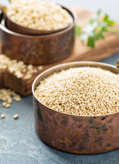 Measuring cups full of quinoa.