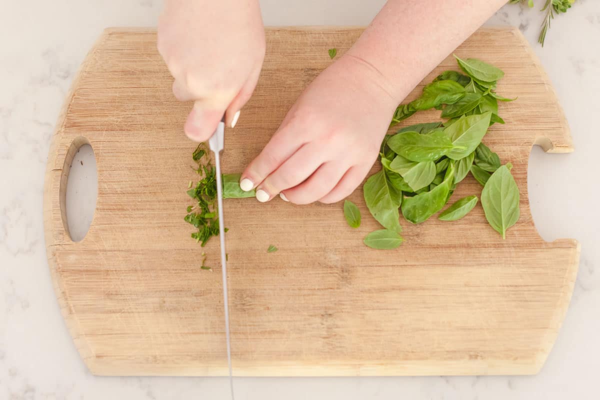 Have fresh herbs all year round with this simple Preserving Herbs with Olive Oil hack.