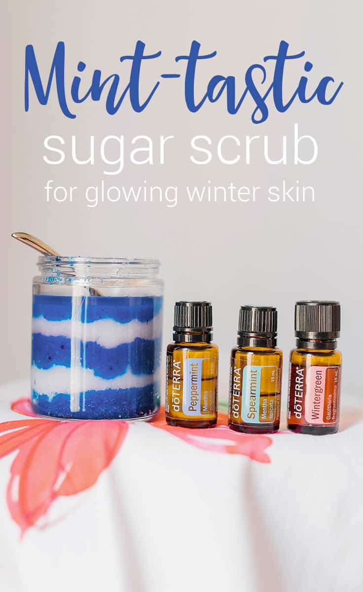 DIY sugar scrub recipe in a jar that is blue and white striped for holiday gift giving. Recipe uses essential oils such as peppermint, spearmint and wintergreen. 