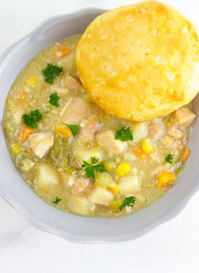Light chicken pot pit in a bowl with a biscuit.