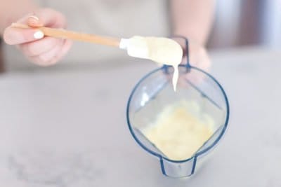 Spatula scooping homemade mayonnaise.