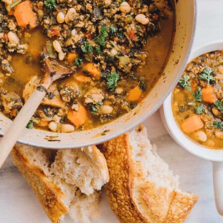 Italian turkey and spinach chili in a pot and a bowl.