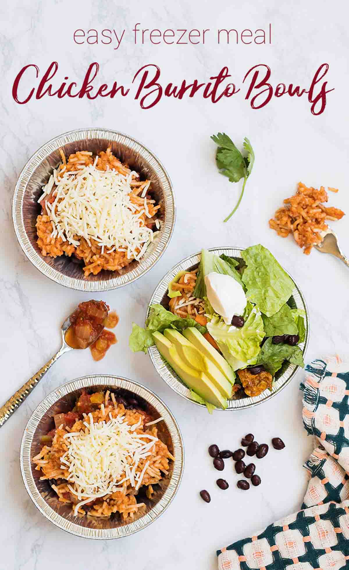 3 chicken burrito bowls with red spanish rice, lettuce and avocado