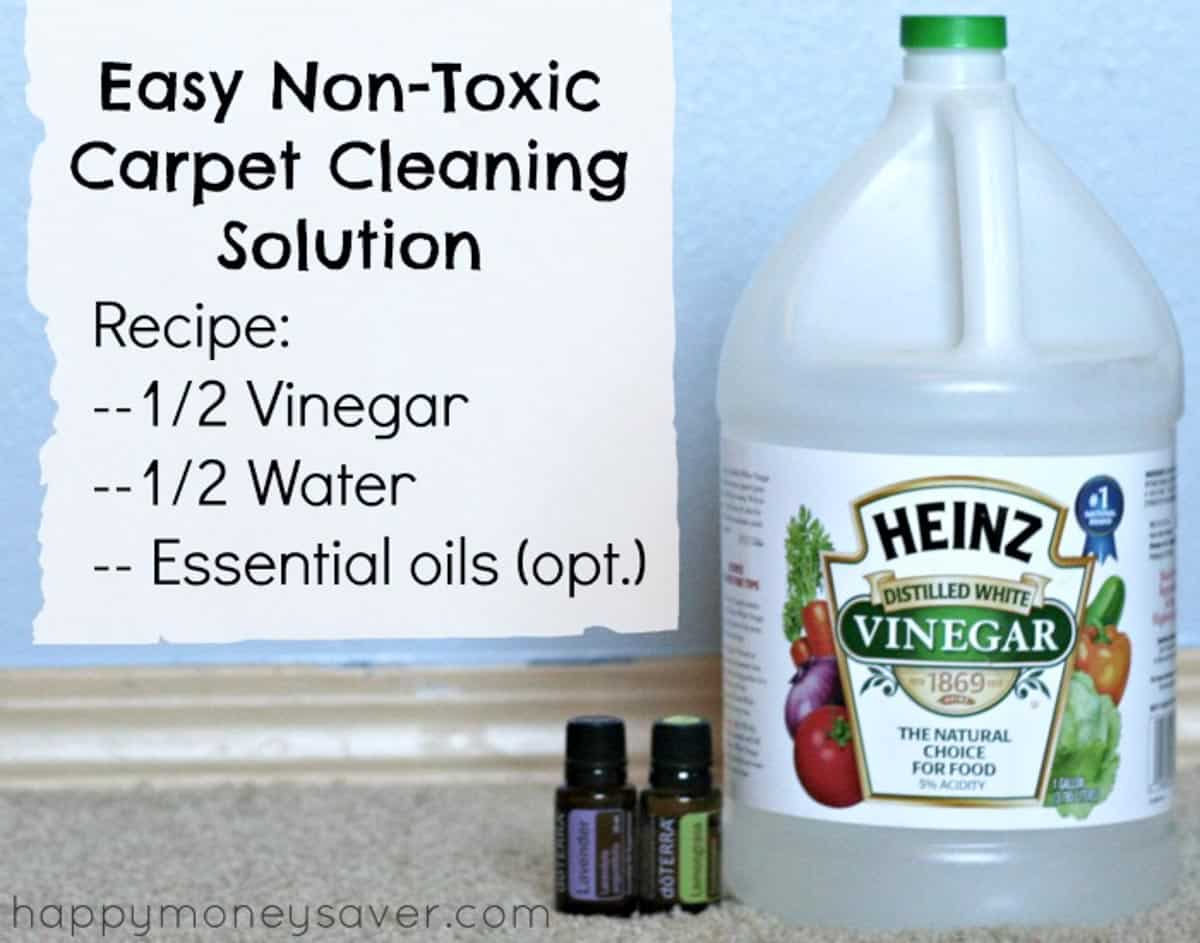 Ingredients on a countertop with text: "Easy non-toxic carpet cleaning solution Recipe: 1/2 Vinegar, 1/2 Water, Essential oils (opt.)"