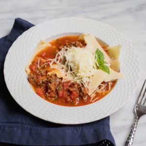 Everything you love in a lasagna, except in a stew! This Lasagna Stew is full of meat, tomatoes, herbs, pasta, and cheese. YUM!