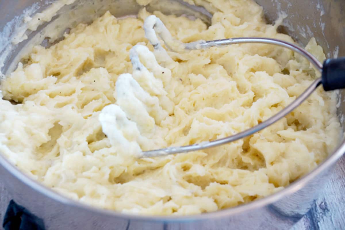 mashed potatoes using a potato masher