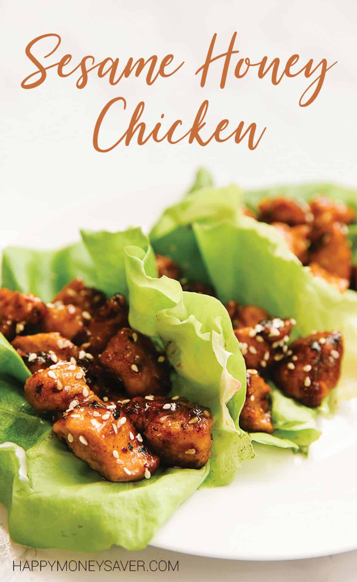 3 lettuce wraps with chicken in them topped with sesame seeds with the words Sesame Honey Chicken at the top and Happymoneysaver.com at the bottom.