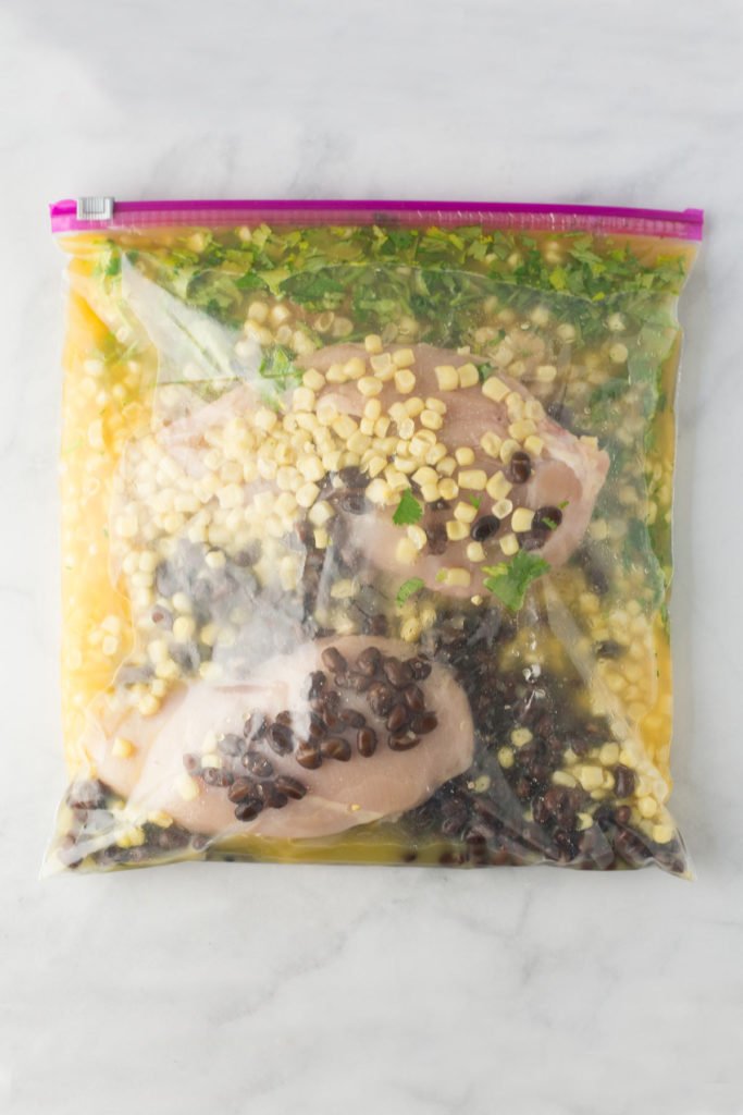Freezer meal Cilantro lime chicken recipe in a gallon sized freezer safe bag. 