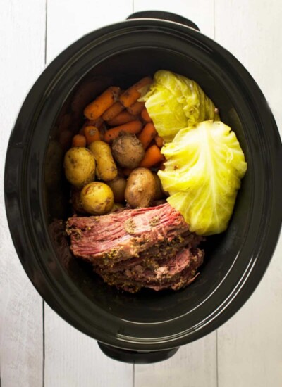 Corned beef and cabbage ingredients in a Crock Pot.