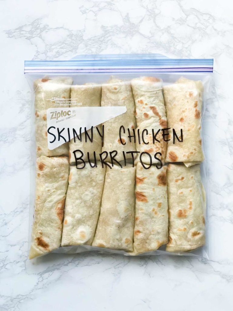10 burritos in a freezer bag with label skinny chicken burritos written on outside. 