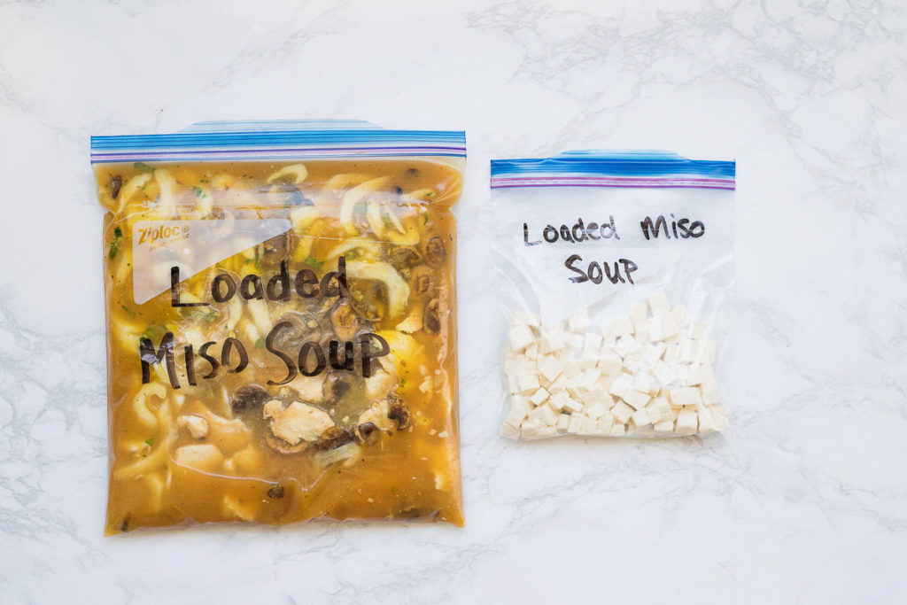 Loaded miso soup recipe in freezer meal bags with tofu