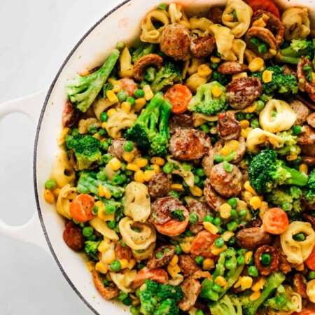 Pot of colorful garlic chicken sausage pasta.