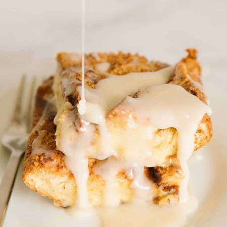 Maple glazed drizzling onto French toast casserole.