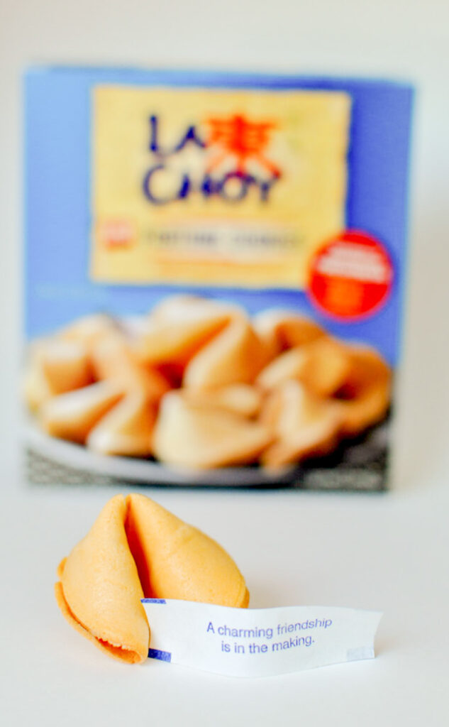 Fortune Cookie with La Choy Fortune cookie container in background