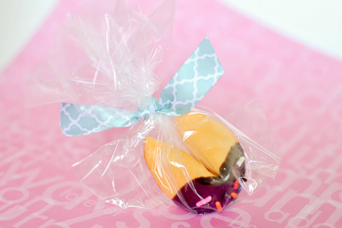 Chocolate Dipped Custom Fortune cookie gift idea - wrapped in a plastic bag & tied with blue ribbon