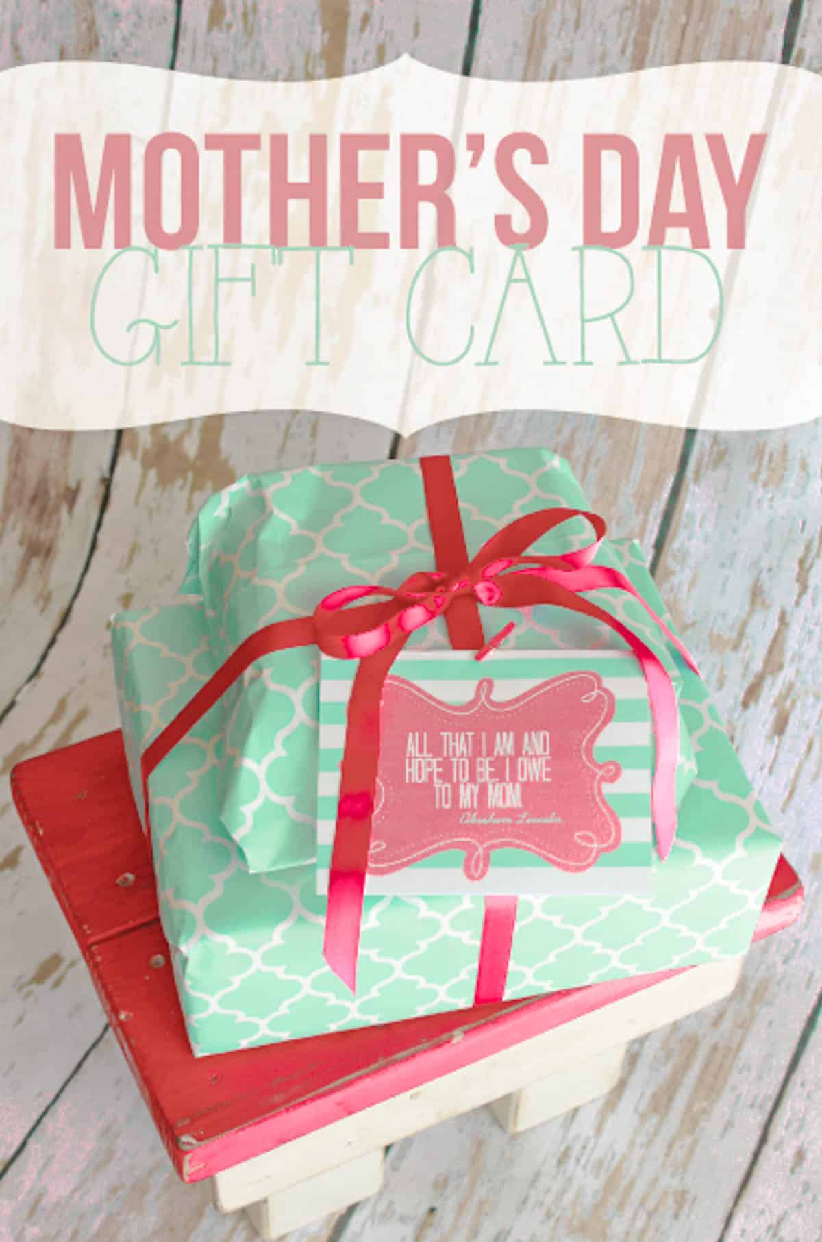 Free printable Mother's day card tag on top of two wrapped presents. 