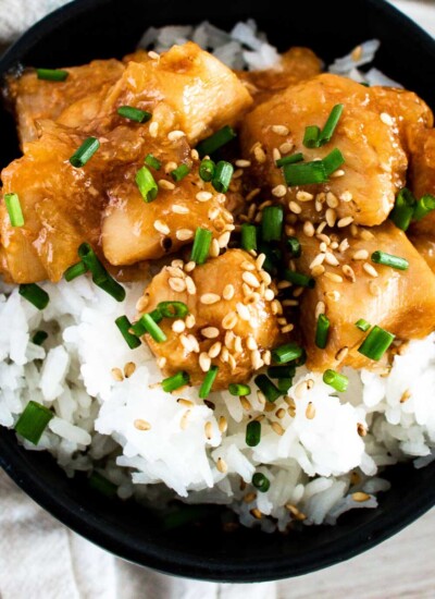 Bowl of teriyaki chicken over rice.