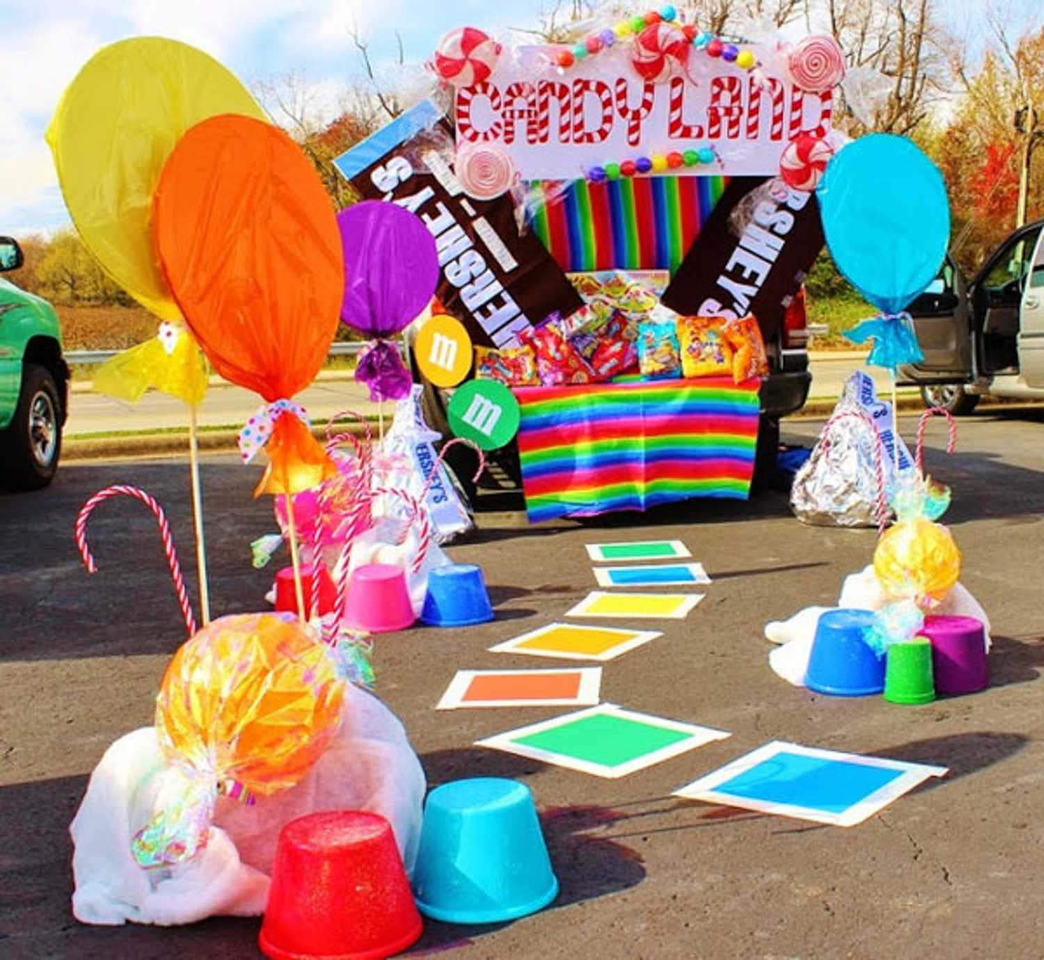 A candyland theme trunk or treat with big candies and balloons - great ideas for truck bed!