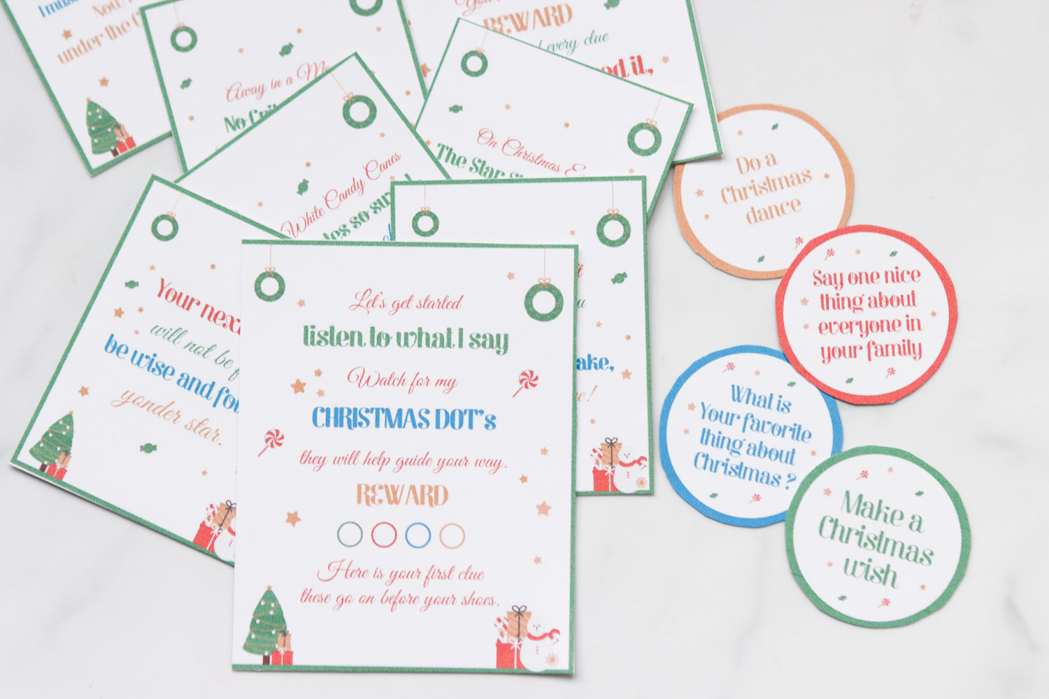 All the free printable clues cut out and on a white surface,