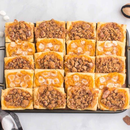Baking dish of sweet potato souffle puff pastries.